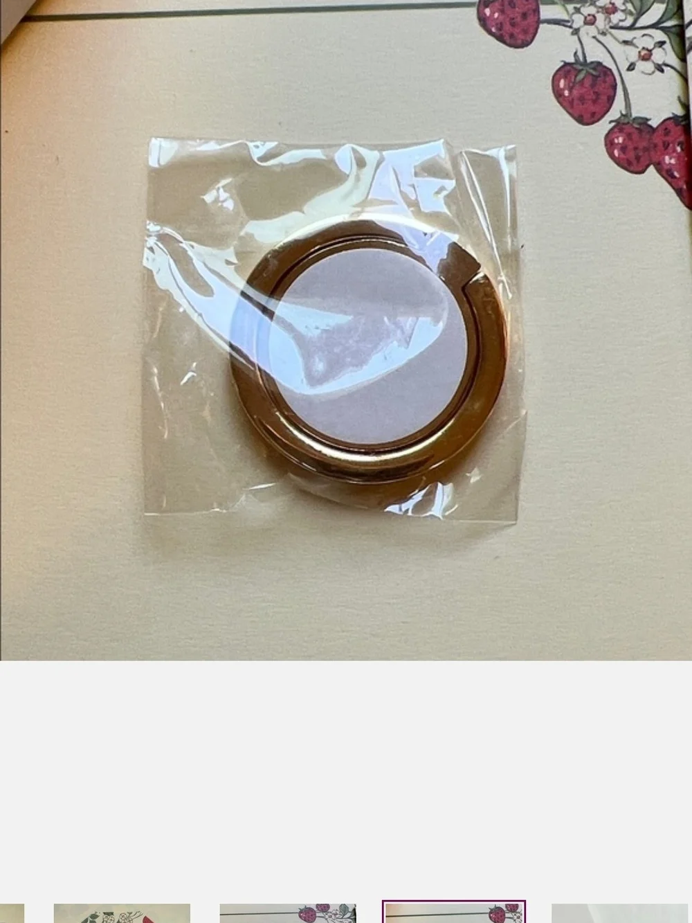 Gold Logo CC Ring Phone Holder. GWP